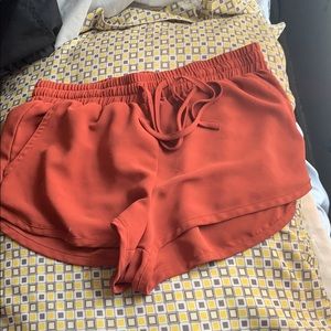 Orange ish red ish short